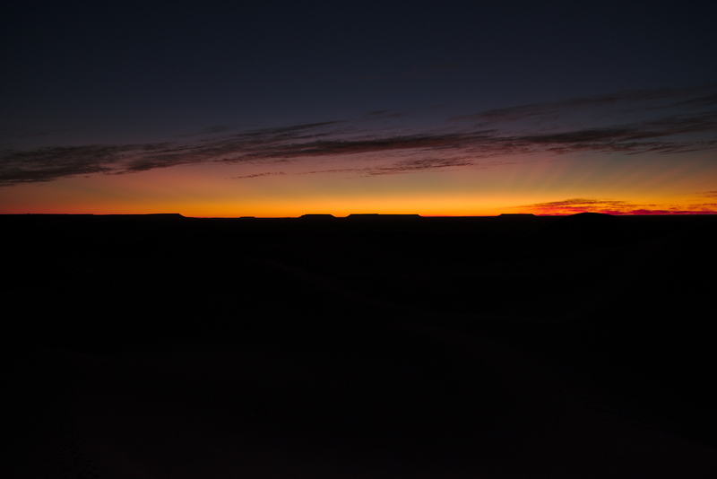 Couché du soleil du haut d'une dune